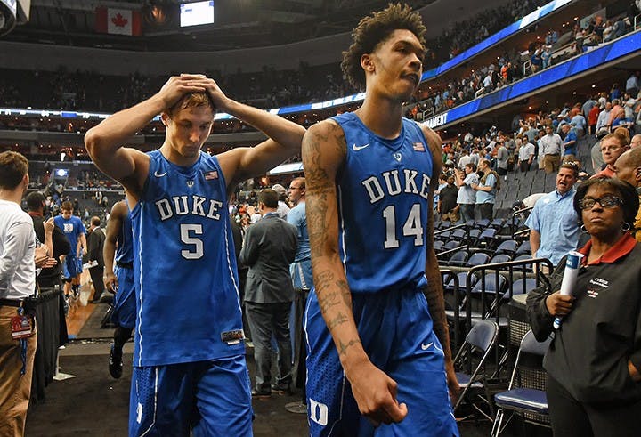 Duke guard Luke Kennard (5) and guard Brandon Ingram (14) leave the floor after losing in overtime to Notre Dame 84-79 at the ACC Tournament at the Verizon Center on March 10, 2016 in Washington, D.C. (Chuck Liddy/Raleigh News &amp; Observer/TNS) 