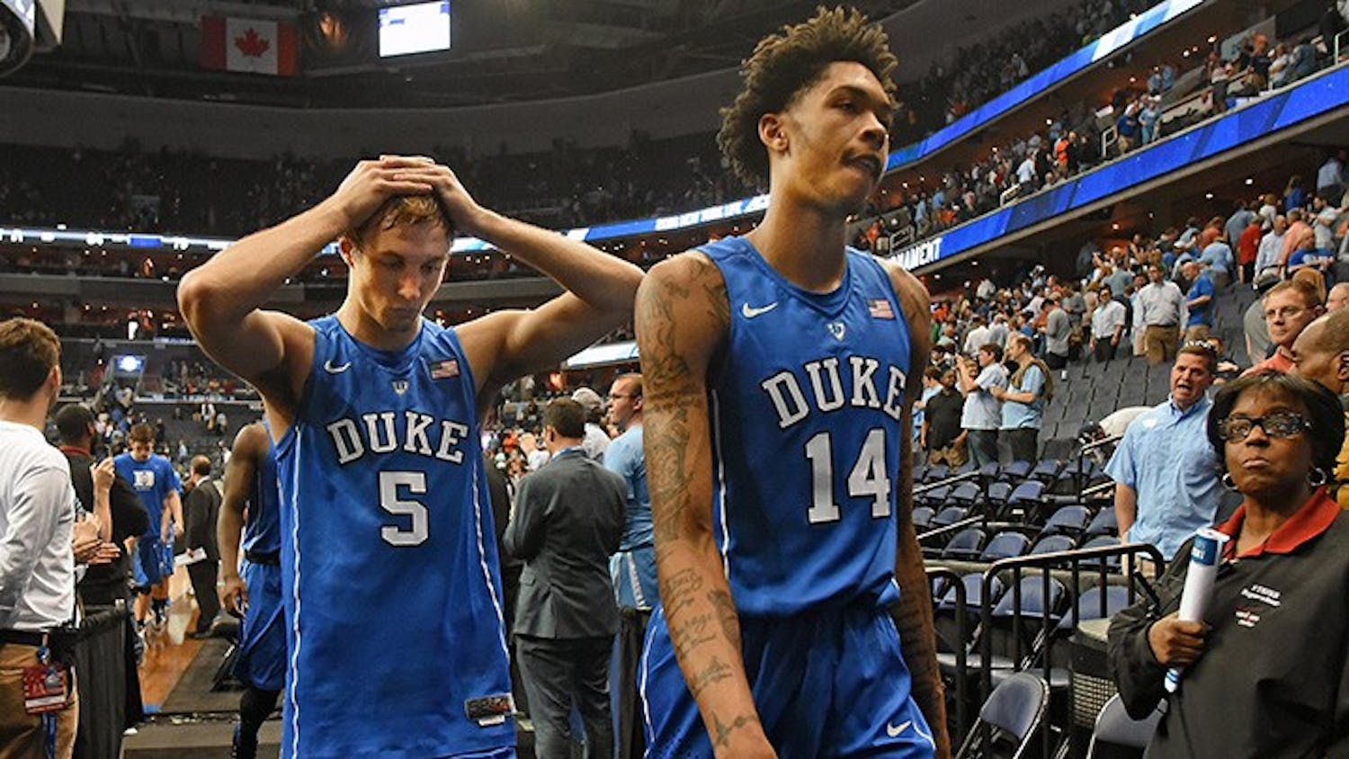 Duke guard Luke Kennard (5) and guard Brandon Ingram (14) leave the floor after losing in overtime to Notre Dame 84-79 at the ACC Tournament at the Verizon Center on March 10, 2016 in Washington, D.C. (Chuck Liddy/Raleigh News & Observer/TNS)