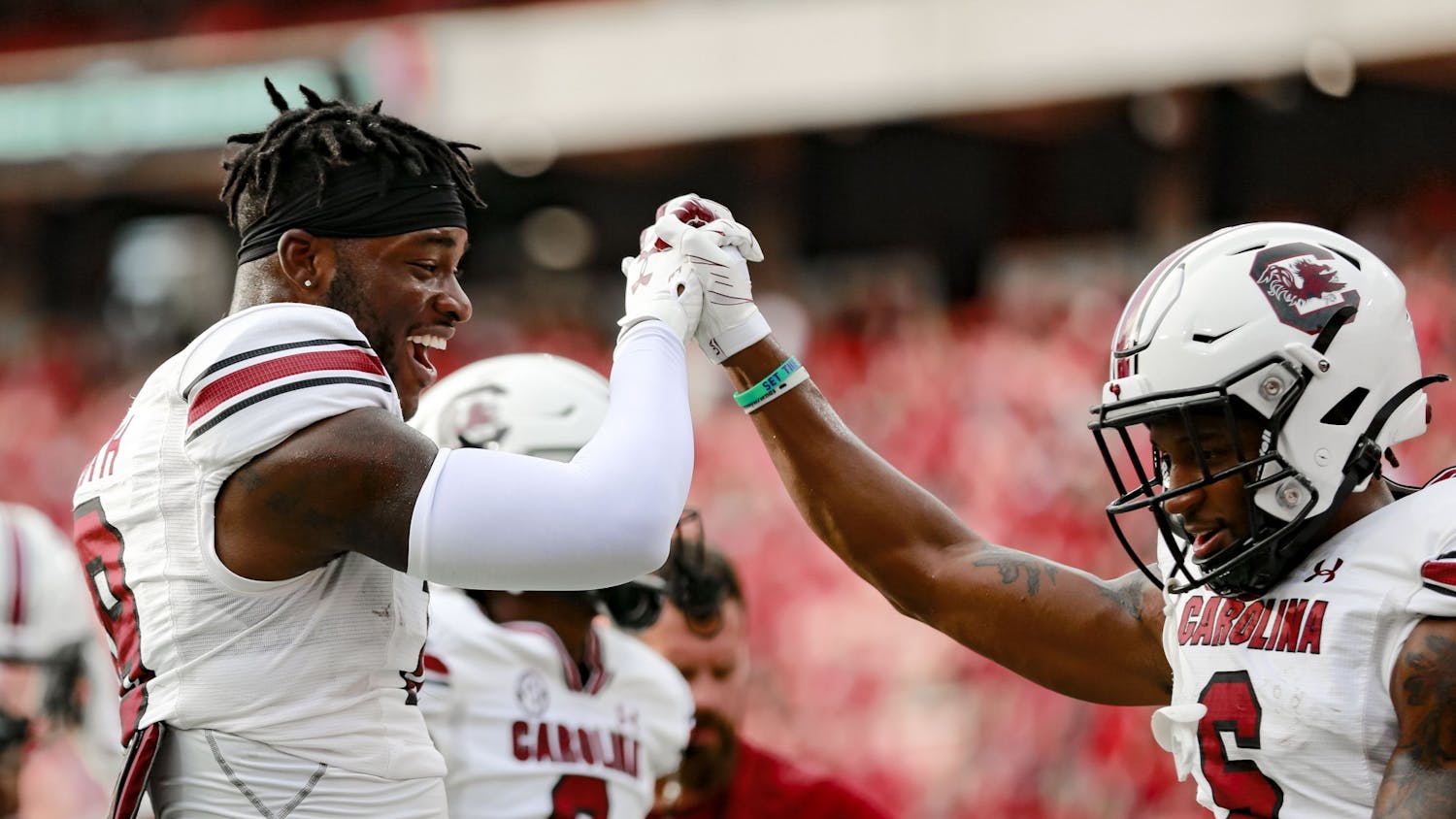 FILE—Redshirt junior defensive back Cam Smith and senior wide receiver Josh Vann have fun before South Carolina's game against Georgia on Sept. 18, 2021. The Gamecocks lost 40-13 to Georgia.&nbsp;
