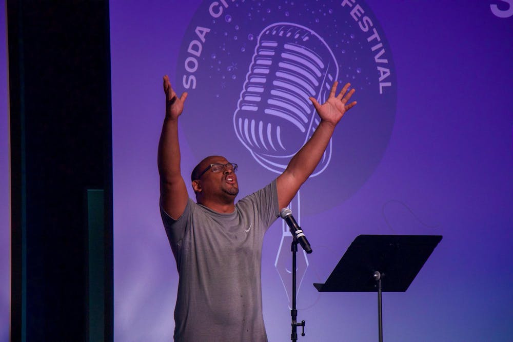 <p>Lester “Blless” Boykin delivers an emotional and heartfelt reading of an original poem during the open mic session of the inaugural Soda City Poetry Festival on June 22, 2024. The festival aimed to promote and celebrate local and regional poets and artists.</p>