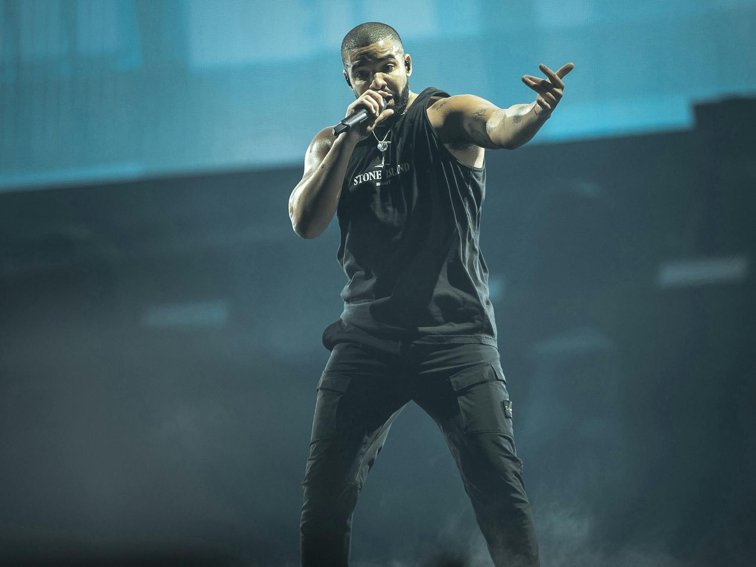 Drake performs on stage as a new cameo on Bad Bunny's smash hit "MIA" the rapper notched his 12th appearance on a Billboard top 10 single in 2018. That sets a new record over the prior landmark set by the Beatles in their world-conquering year of 1964. (Gonzales/Samy Khabthani/Avalon/Zuma Press/TNS)