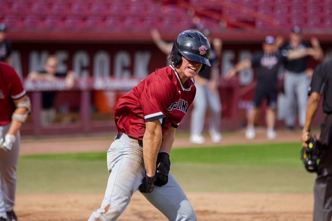 Sophomore outfielder Evan Stone celebrates scoring an early run for the Garnet team on Nov. 5, 2022. Stone participated in 46 games with Gamecocks last season, starting a total of 28 times.