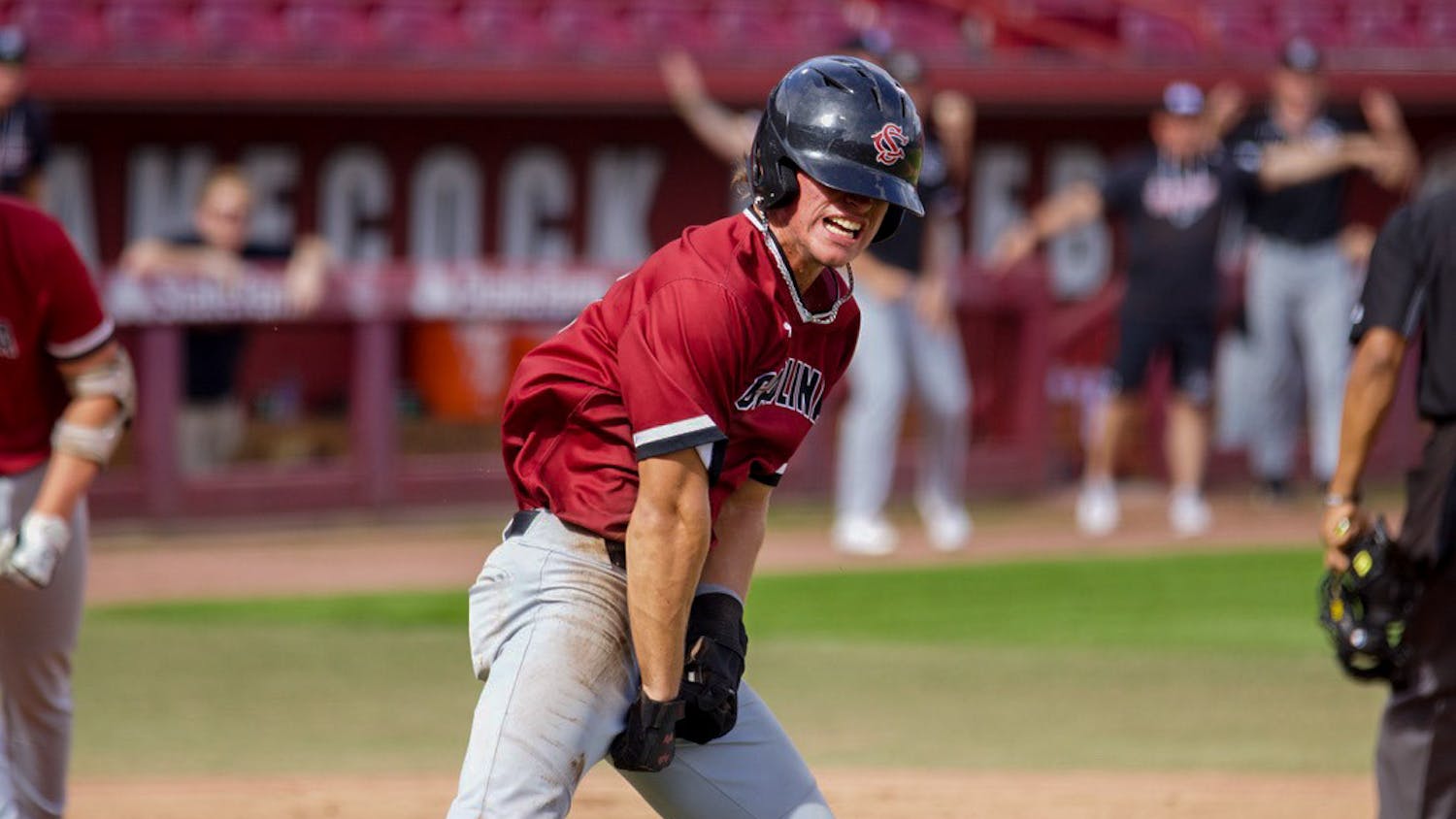 Sophomore outfielder Evan Stone celebrates scoring an early run for the Garnet team on Nov. 5, 2022. Stone participated in 46 games with Gamecocks last season, starting a total of 28 times.