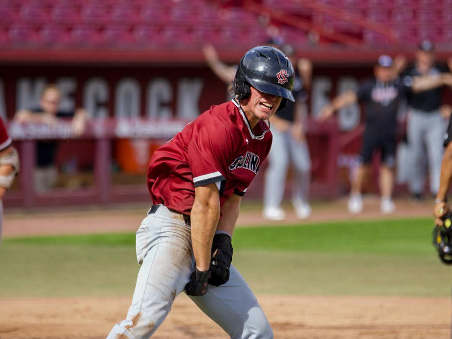 Sophomore outfielder Evan Stone celebrates scoring an early run for the Garnet team on Nov. 5, 2022. Stone participated in 46 games with Gamecocks last season, starting a total of 28 times.