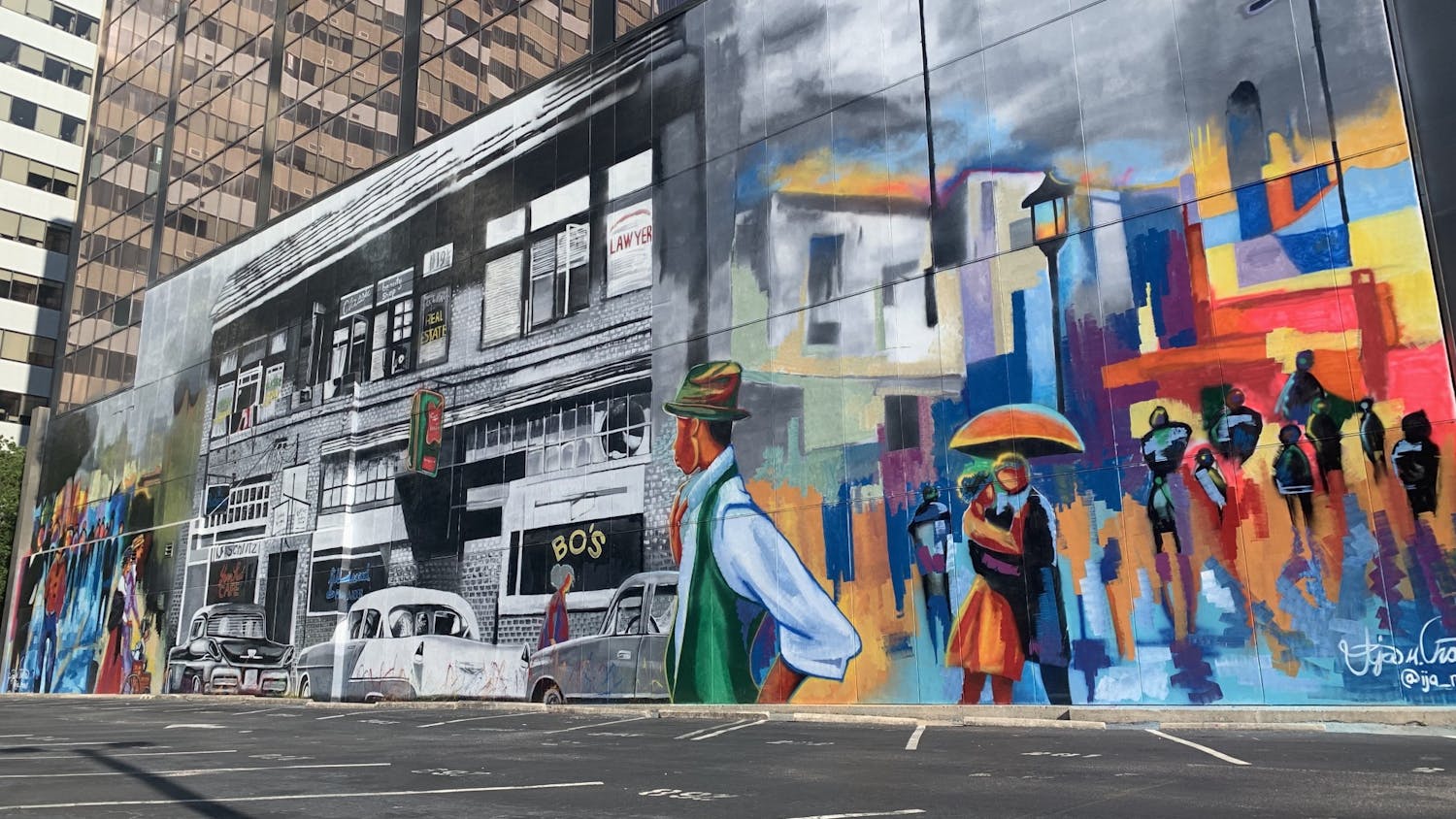 A mural depicting Black Wall Street on the side of the City of Columbia building. The artist, Ija Charles, is a 24-year-old self-starter from Columbia and Louisiana.