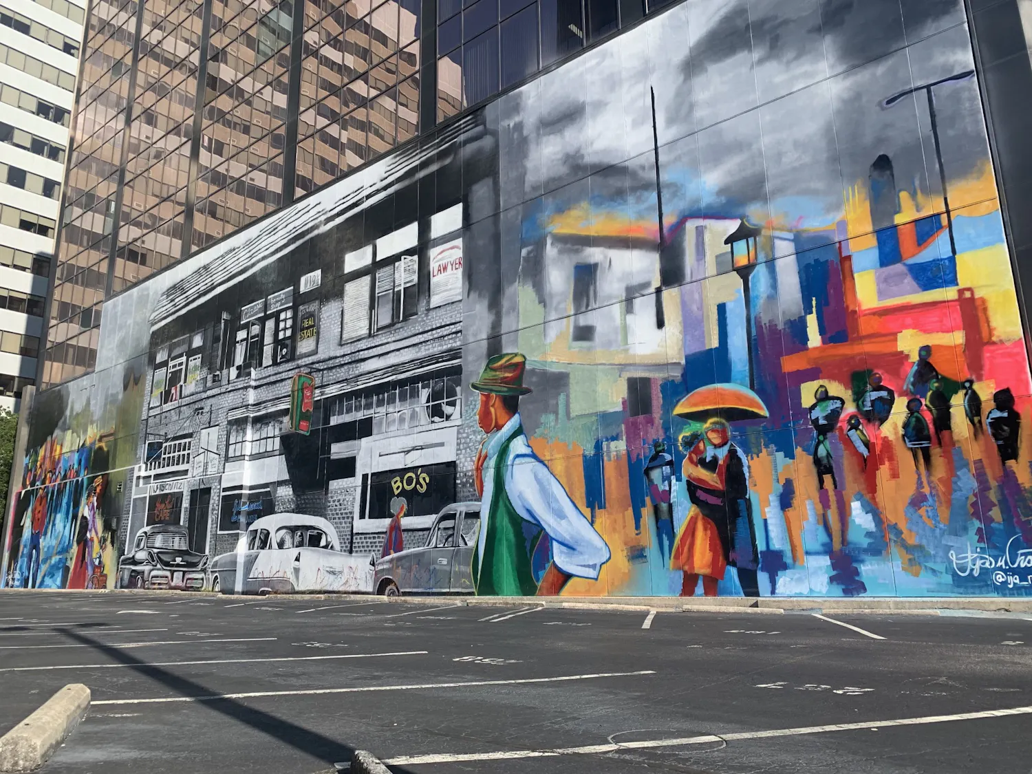 A mural depicting Black Wall Street on the side of the City of Columbia building. The artist, Ija Charles, is a 24-year-old self-starter from Columbia and Louisiana.