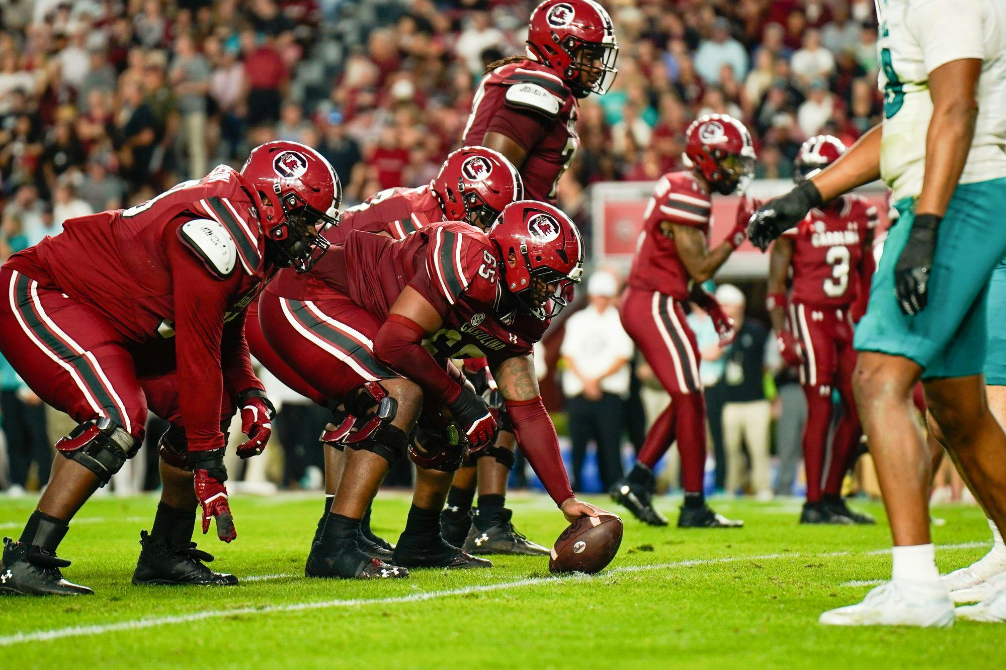 FILE — Sixth year offensive lineman Rodney Newsom Jr sets the ball at the line of scrimmage against Coastal Carolina at Williams-Brice Stadium on Nov. 22, 2025.