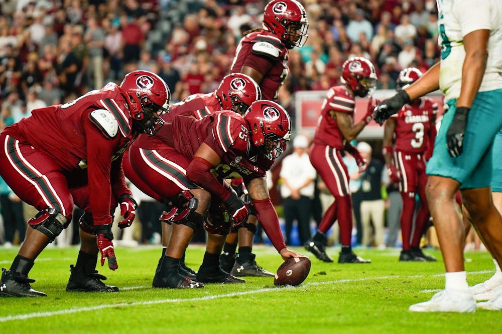 <p>FILE — Sixth year offensive lineman Rodney Newsom Jr sets the ball at the line of scrimmage against Coastal Carolina at Williams-Brice Stadium on Nov. 22, 2025.</p>