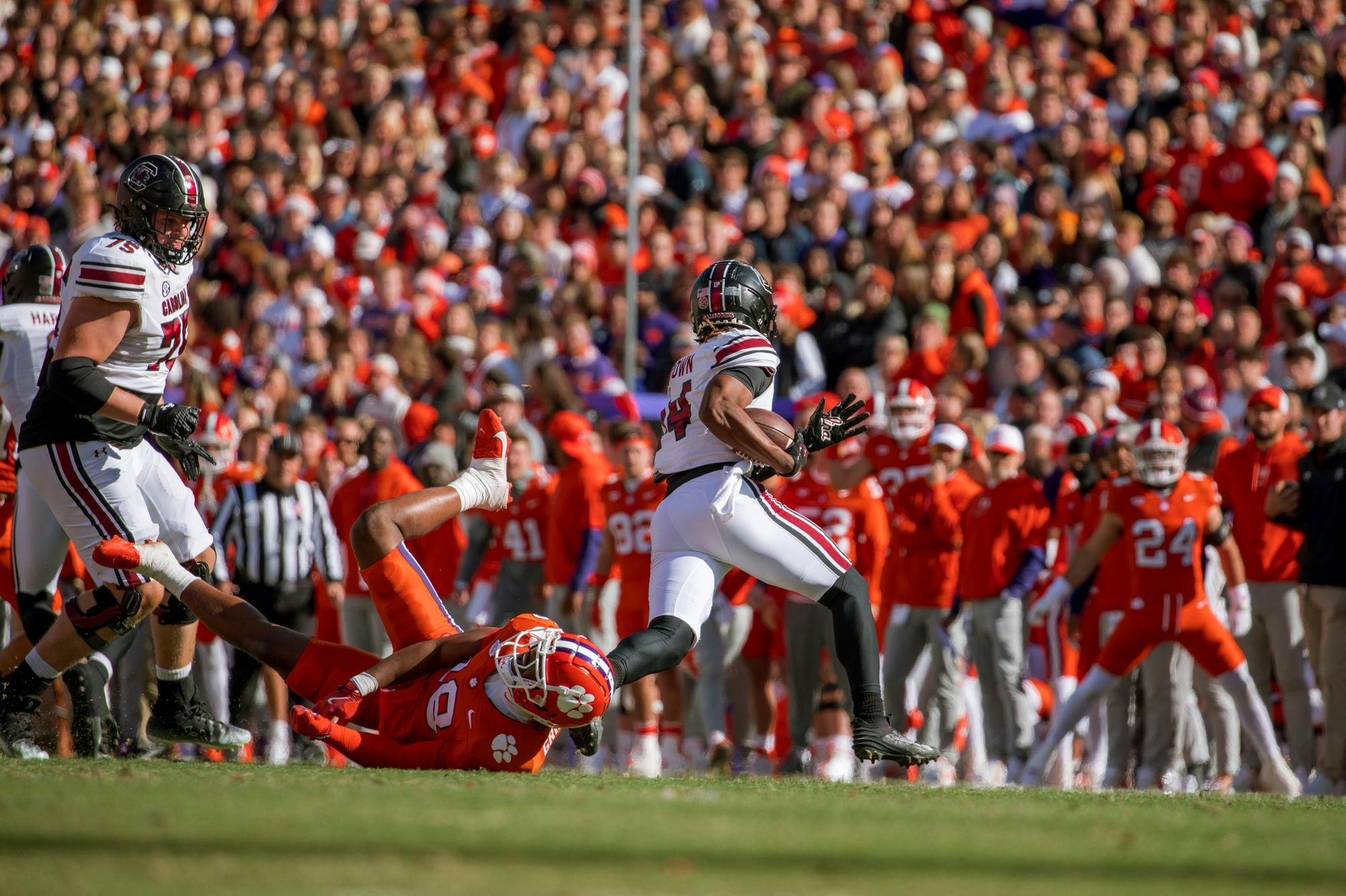 Then-redshirt junior wide receiver Jared Brown runs the football past a Clemson defender on Nov. 30, 2024, at Memorial Stadium in Clemson, South Carolina. The Gamecocks are set to face the Tigers on Nov. 29, 2025, at Williams-Brice Stadium for their annual rivalry football game.