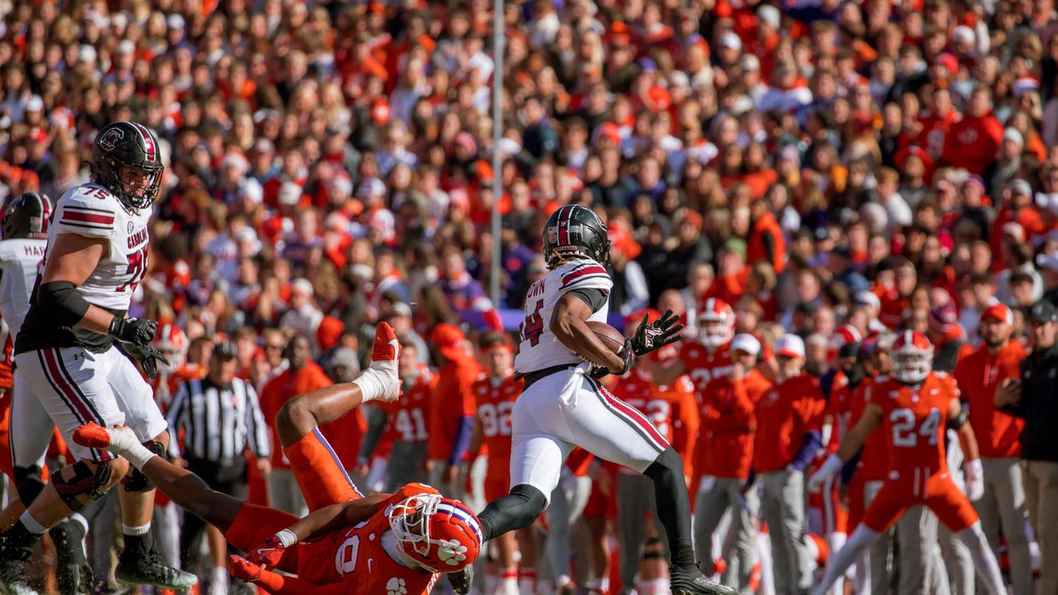 Then-redshirt junior wide receiver Jared Brown runs the football past a Clemson defender on Nov. 30, 2024, at Memorial Stadium in Clemson, South Carolina. The Gamecocks are set to face the Tigers on Nov. 29, 2025, at Williams-Brice Stadium for their annual rivalry football game.