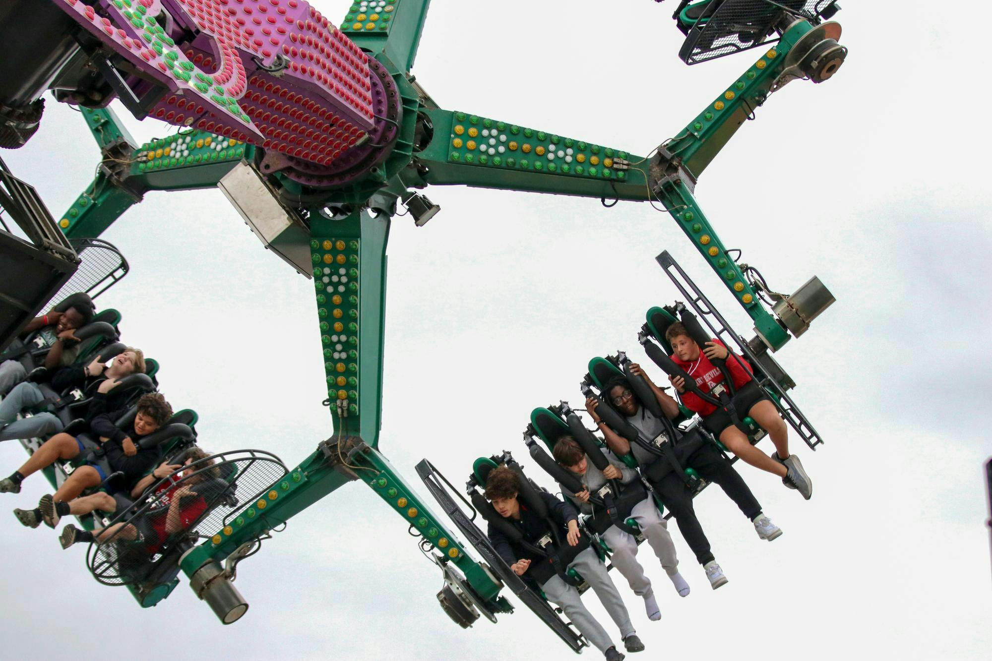 Attendees swing upside down on the "Delusion" ride at the South Carolina State Fair on Oct. 10, 2025. The fair hosts more than 400,000 visitors each year from across the Southeastern United States.