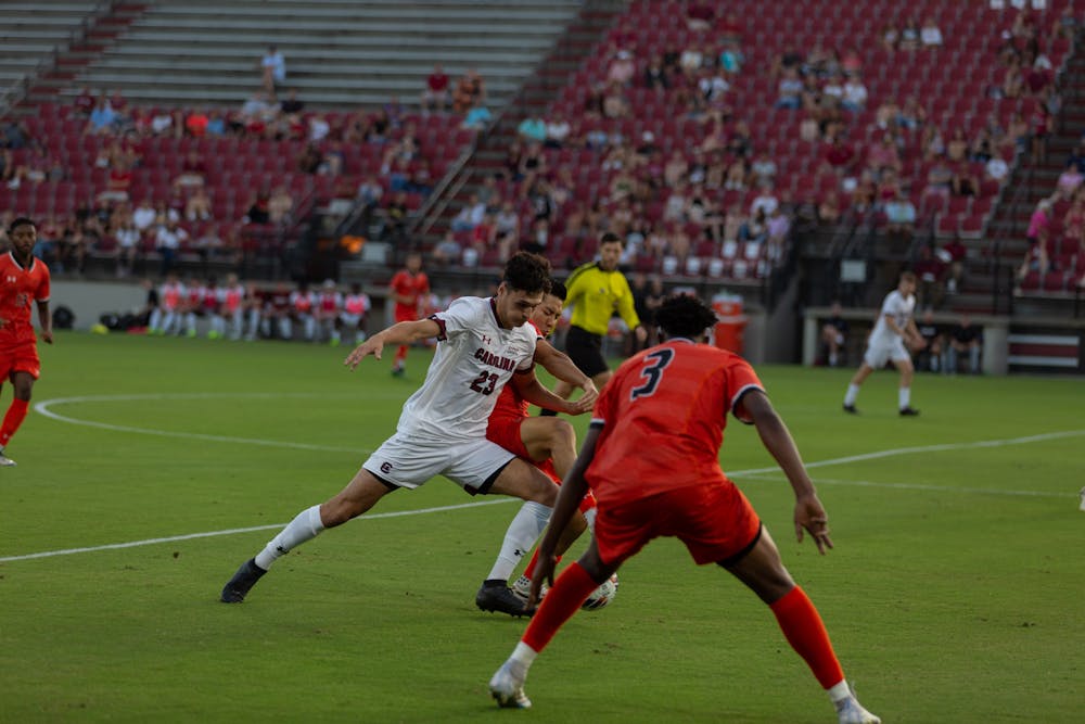 <p>FILE - Sophmore forward Harrison Myring moves down the field and attempts to power past the Campbell defenders during a game on Saturday evening, Sept. 17, 2022.&nbsp;</p>
