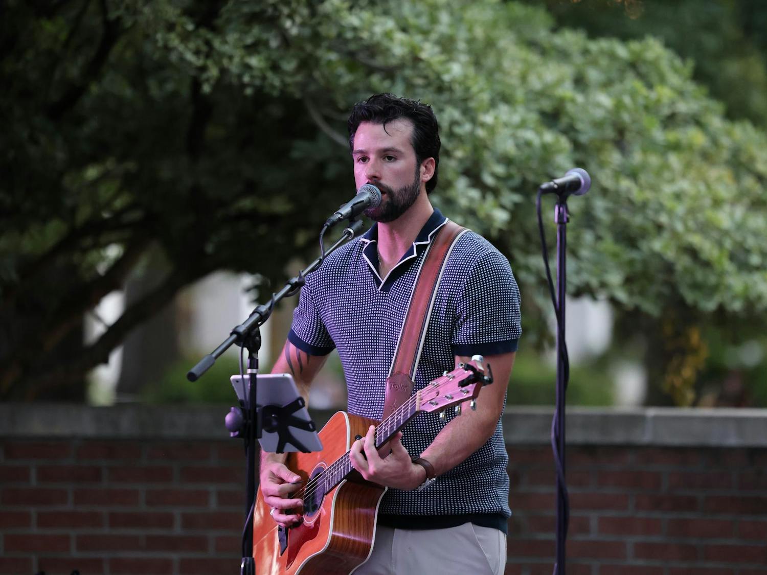 A performer plays for students on the Russell House patio during the First Night Carolina event on Aug. 19, 2024. Students were offered free food, carnival games, live music and a fireworks show as part of the annual event.