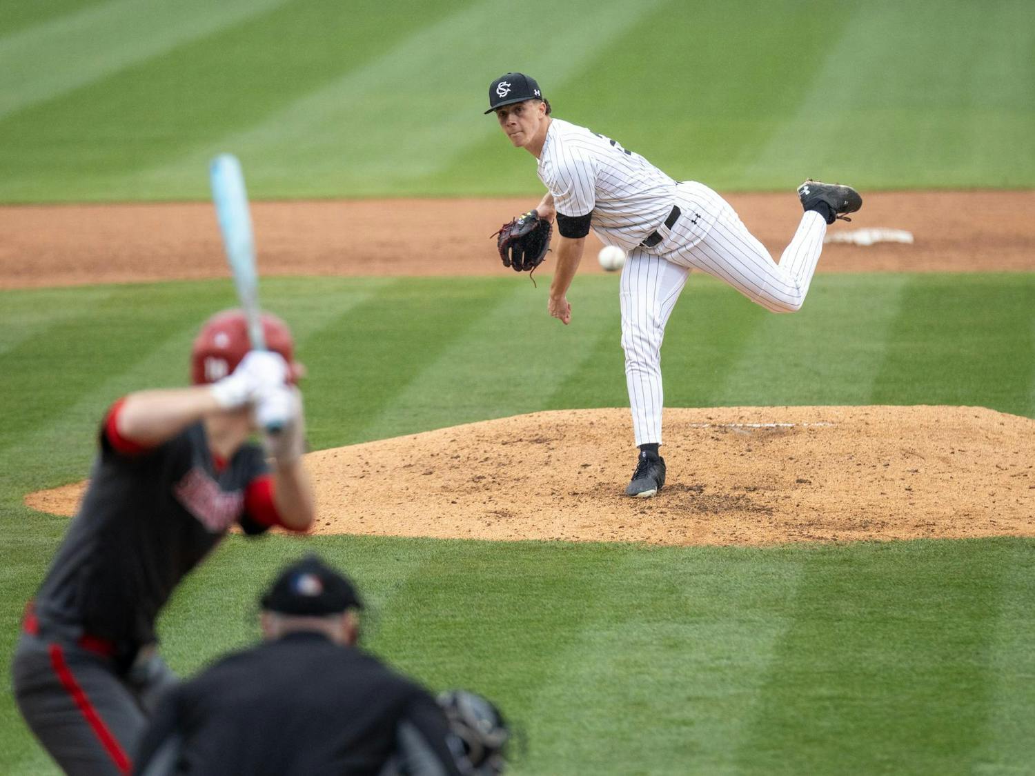 FILE — Senior pitcher Matthew Becker throws a pitch during a game against Sacred Heart University on Feb. 15, 2025, at Founders Park. Becker threw for five innings, earning nine strikeouts and allowing only one hit.