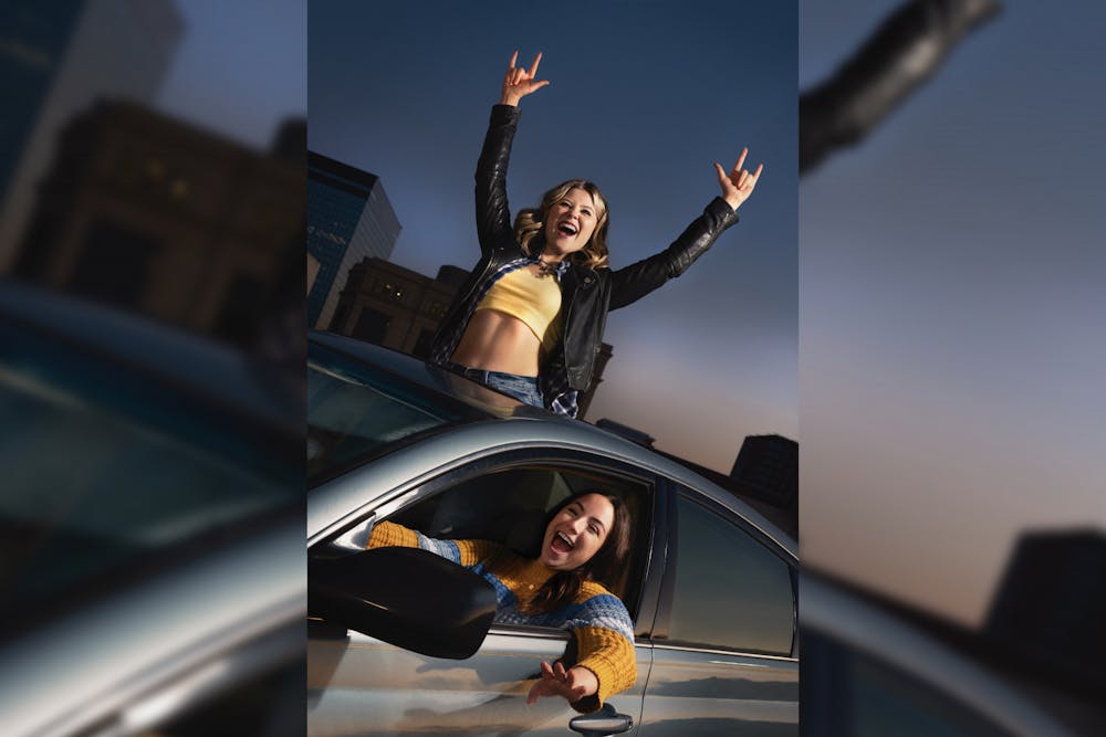 <p>A promotional picture for "The Mad Ones" with performers Elise Heffner (top) and Lily Smith (bottom) driving around Columbia. "The Mad Ones" will be performed at Trustus Theatre every night from Feb. 24 to March 18 at 8 p.m., except for the performance on March 2, which will take place at 7 p.m.</p>