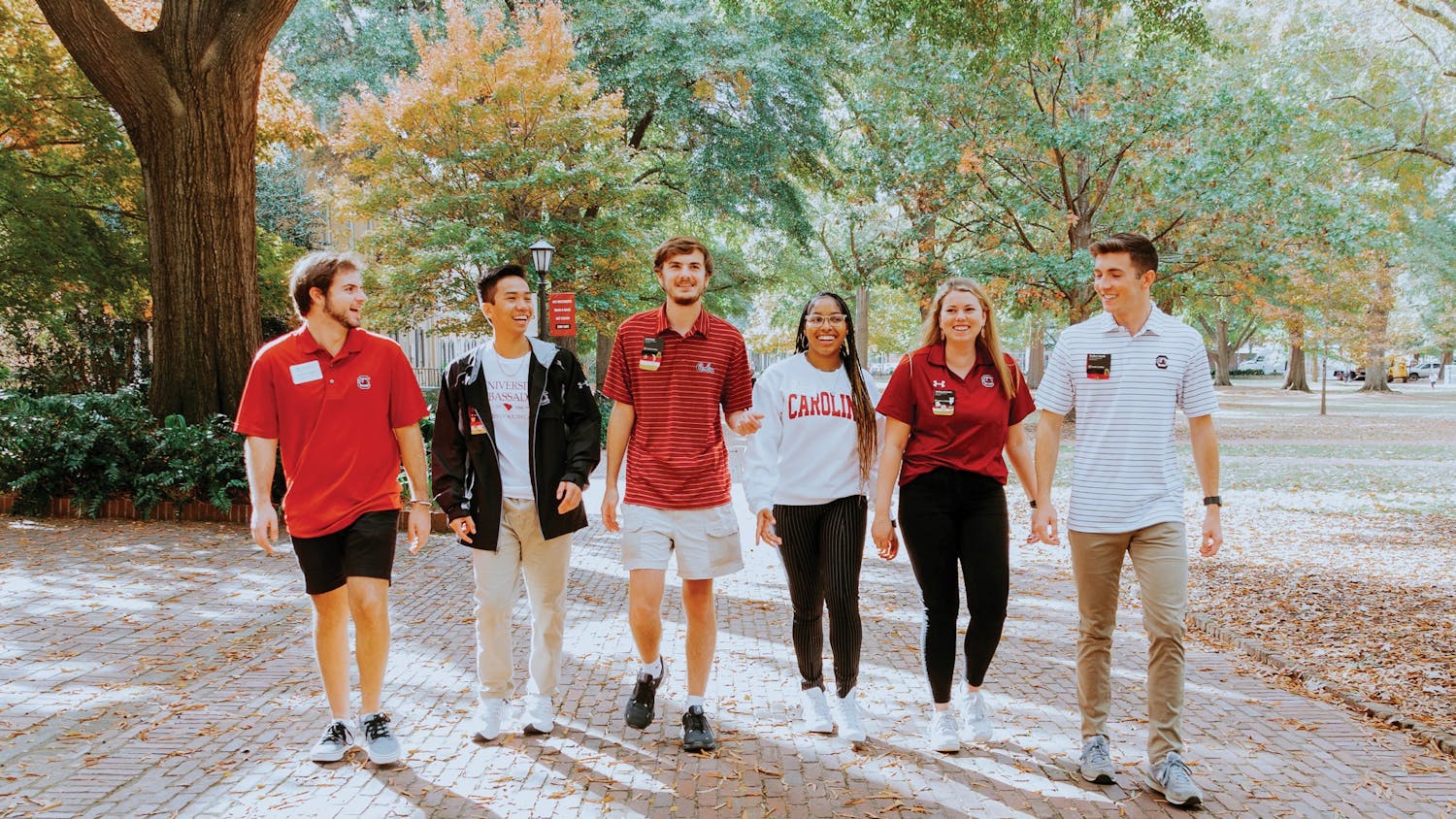 Members of the University Ambassadors team walk together on the Horseshoe. University Ambassadors help prospective students learn more about being a USC student.