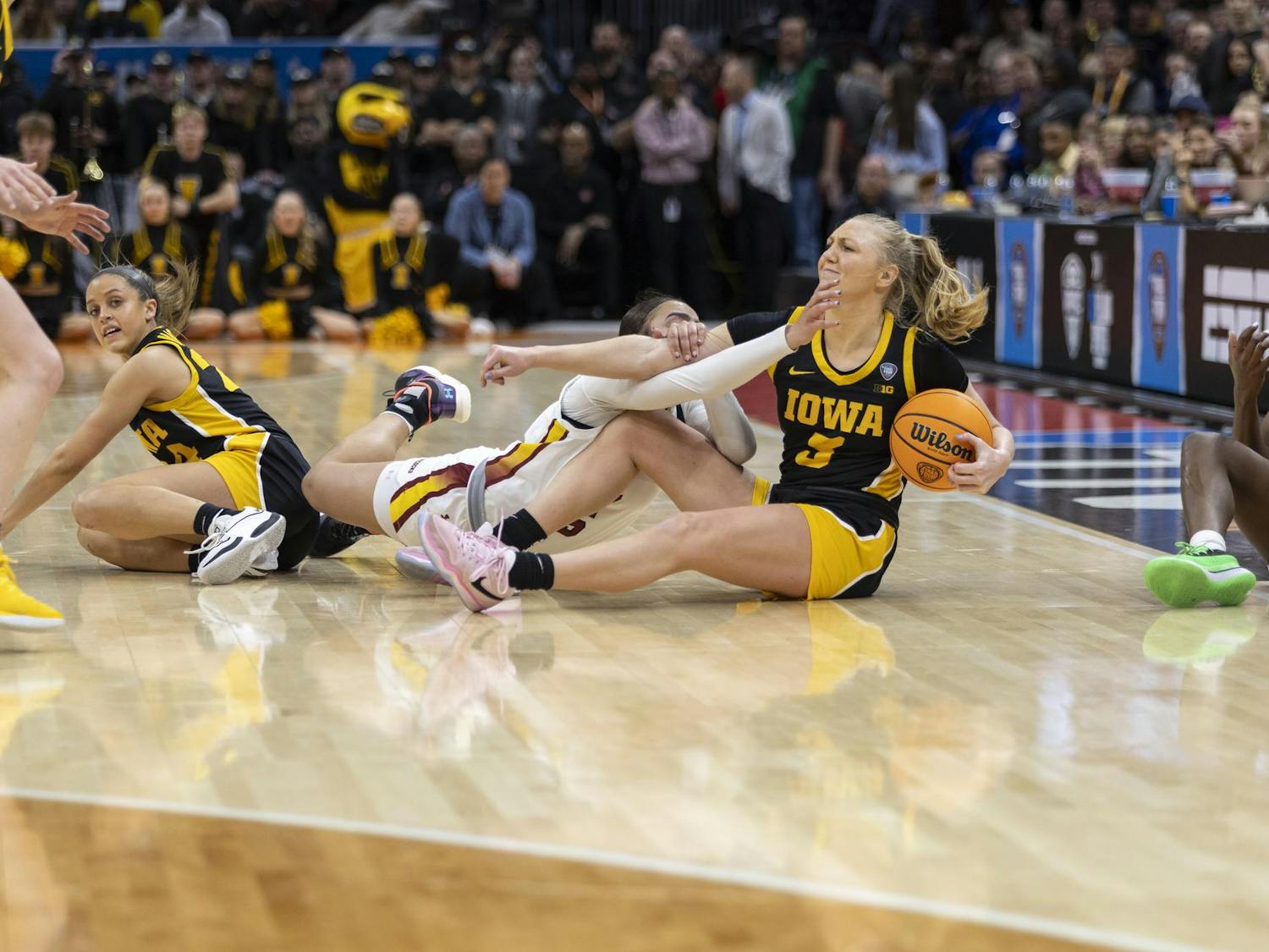 Gamecock freshman guard Tessa Johnson fights to grab the ball from Hawkeye junior guard Sydney Affolter in the final minutes of the national championship game on April 7, 2024. The Gamecocks fought back from an 11 point deficit to win the game 87-75.