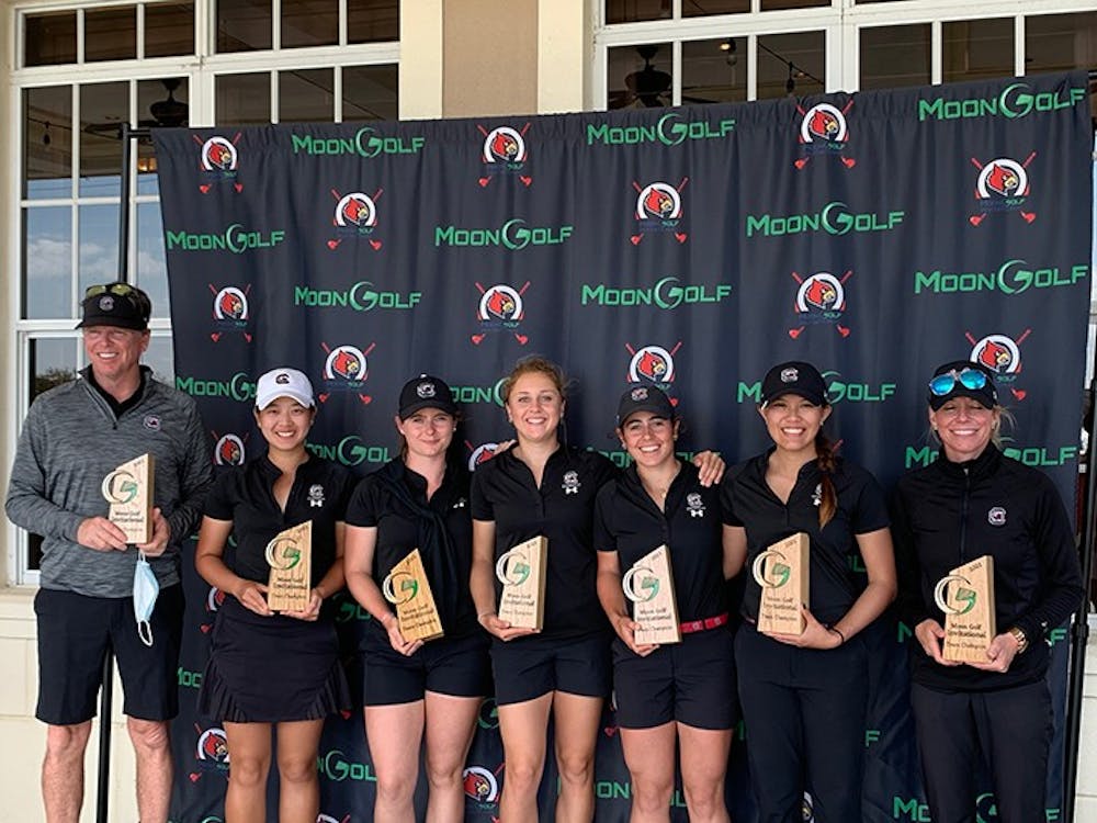 <p>The women's golf team poses for a photo at the Moon Golf Invitational in Melbourne, Florida. The tournament win was the first of the spring season for the No. 2 Gamecocks.&nbsp;</p>