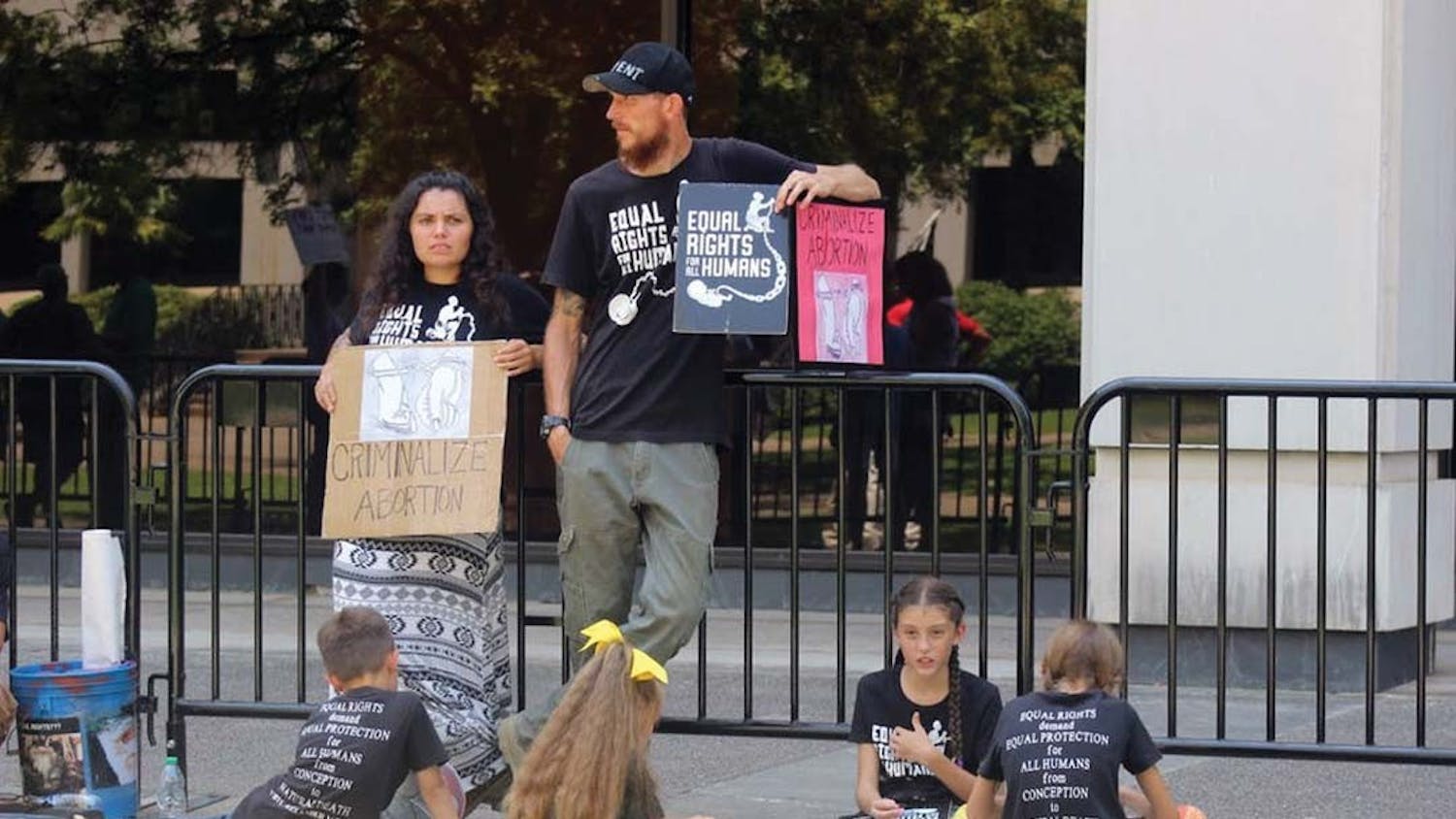 Annie Wirth and her husband call for abortion to be criminalized. Activists gathered outside the South Carolina Statehouse July 7, 2022 to voice their opinion on the state's abortion laws.
