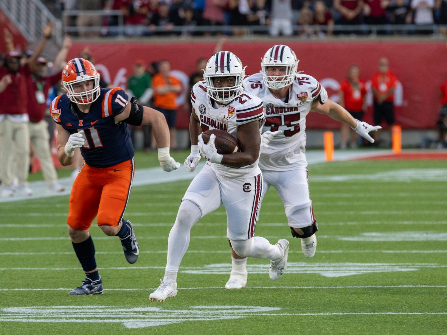 Sixth-year running back Oscar Adaway III runs the ball down the field, resulting in a touchdown against Illinois in the Cheez-It Citrus Bowl. The Gamecocks were chosen to face the Fighting Illini at Camping World Stadium on Dec. 31, 2024 after missing a spot in the College Football Playoffs.