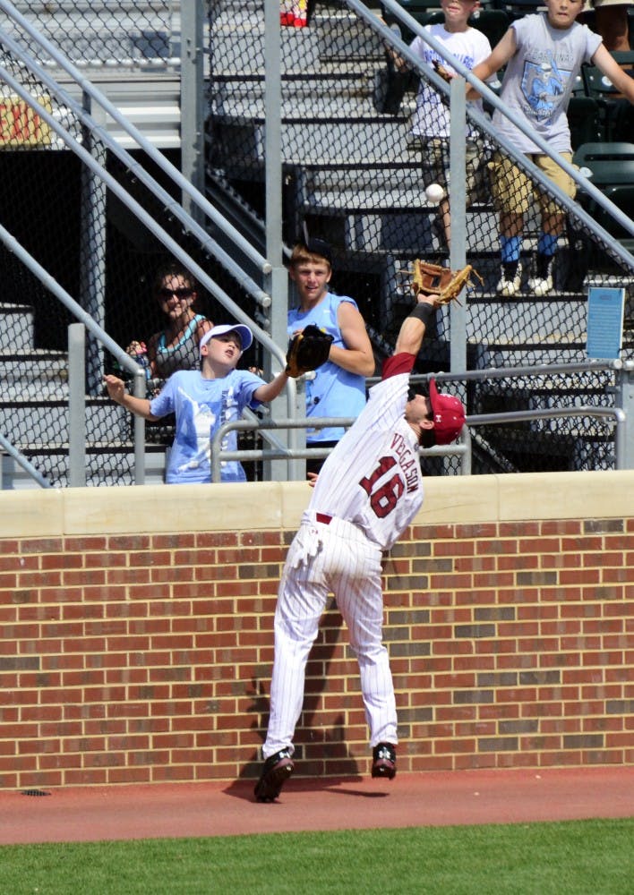 Chase Vergason catches a foul ball for an out.