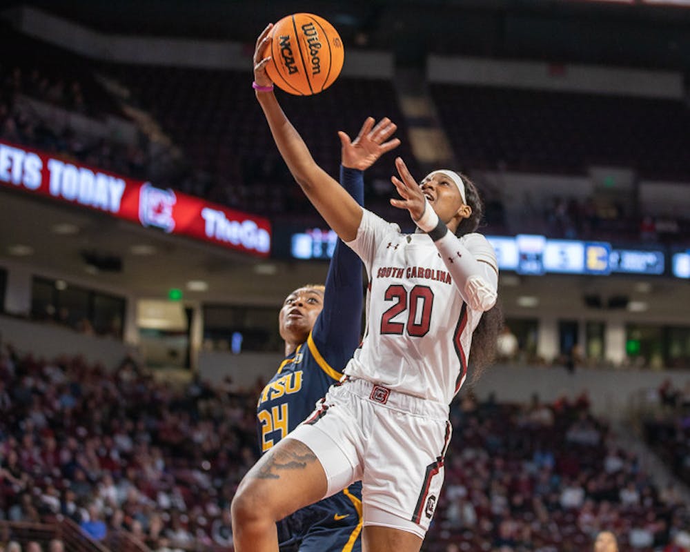 <p>Sophomore Sania Feagin attempts the contested layup during the fast break during South Carolina's matchup with East Tennessee State on Nov. 7, 2022. Feagin finished the game with 15 points.&nbsp;</p>
