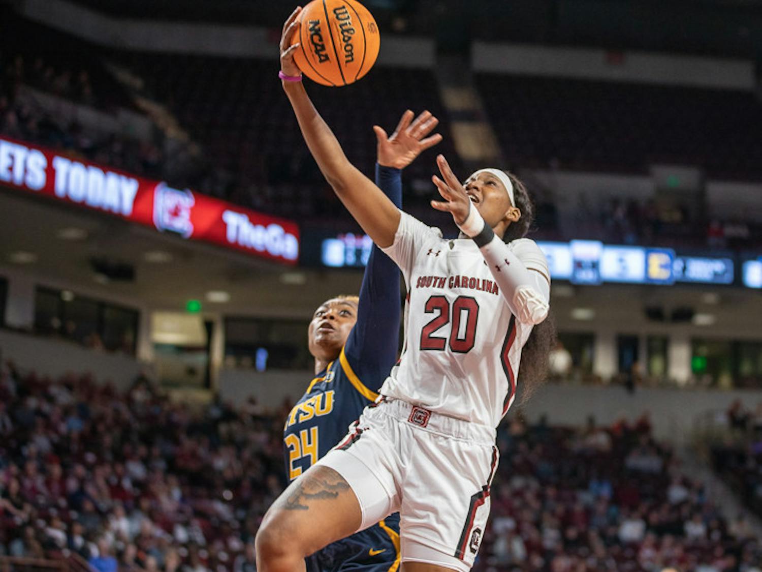 Sophomore Sania Feagin attempts the contested layup during the fast break during South Carolina's matchup with East Tennessee State on Nov. 7, 2022. Feagin finished the game with 15 points.&nbsp;