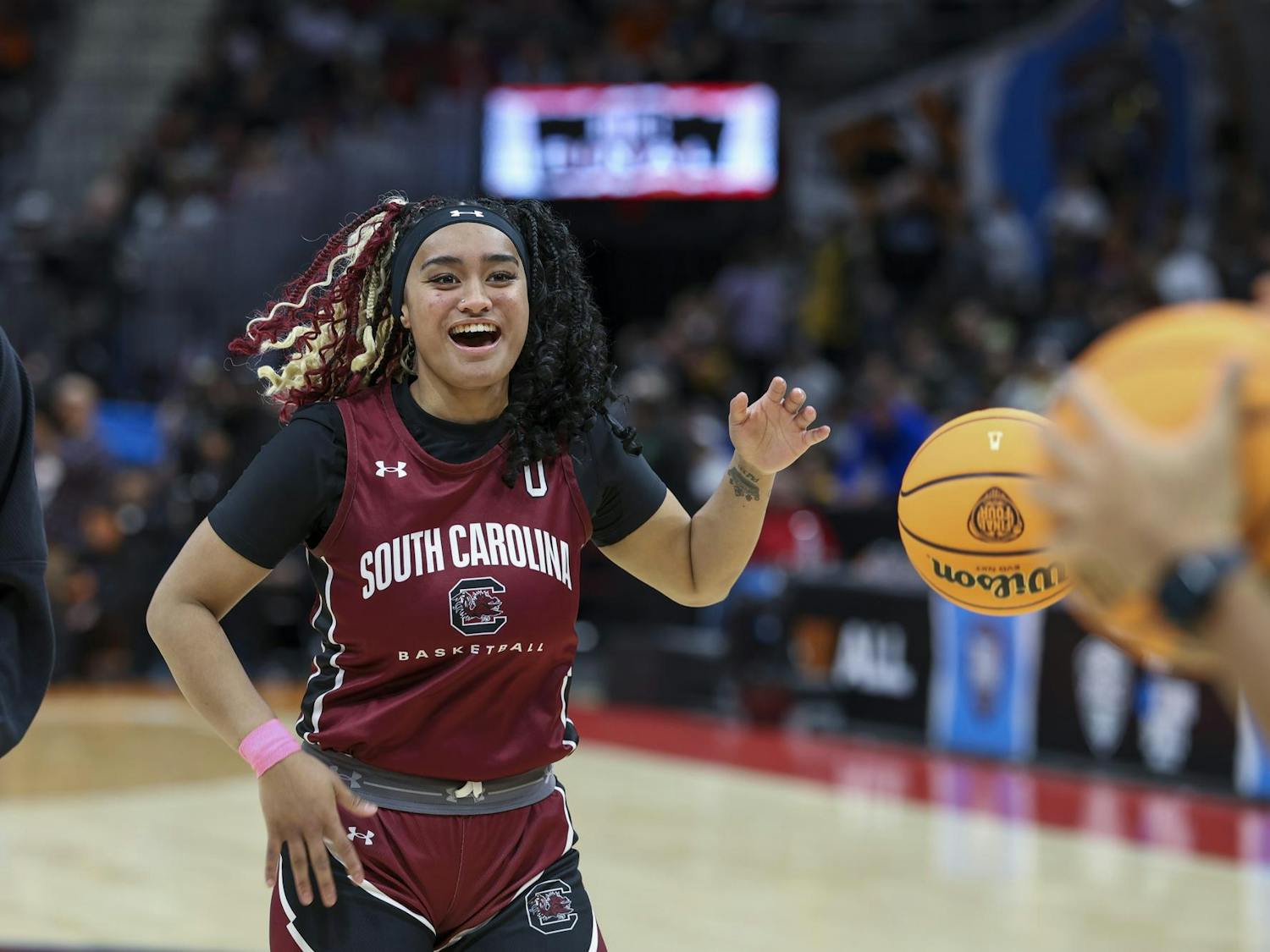 Senior guard Te-Hina Paopao laughs while asking for the ball during open practice on April 6, 2024, at Rocket Mortgage FieldHouse. Paopao, along with other members of the Gamecock basketball team, danced when the announcer introduced her to the crowd of fans who gathered for the practice.