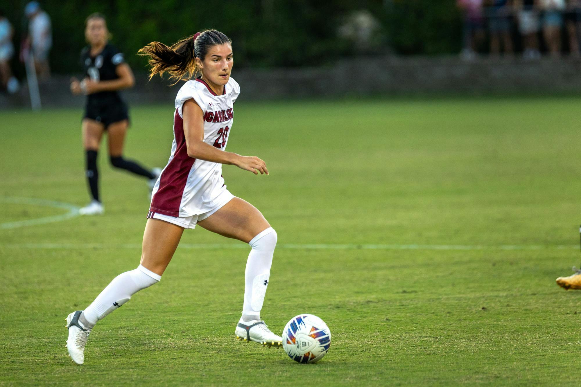 Gamecock fifth-year forward Corinna Zullo dribbles the ball during the South Carolina victory over the College of Charleston at Stone Stadium on Aug. 25, 2024. Zullo scored two goals for the Gamecocks during the team’s 4-1 victory over the Cougars.