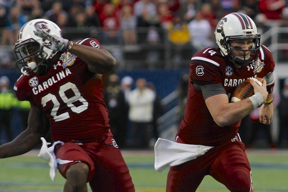 	Quarterback Connor Shaw ran 16 times for 47 yards and one touchdown at the Capital One Bowl on Jan. 1. He also had four touchdowns through the air, three passing and one receiving.