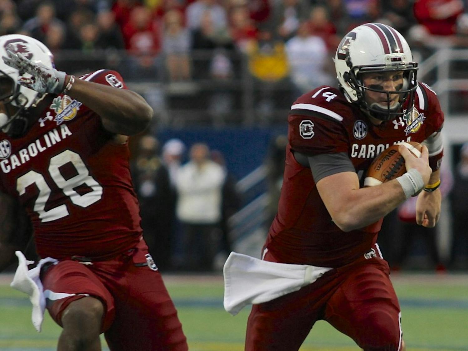 	Quarterback Connor Shaw ran 16 times for 47 yards and one touchdown at the Capital One Bowl on Jan. 1. He also had four touchdowns through the air, three passing and one receiving.