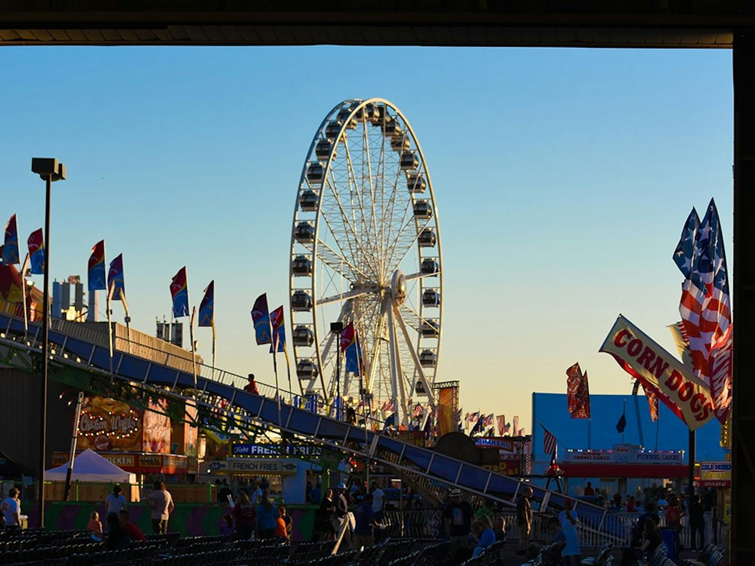The Ferris wheel at the South Carolina State Fair sits prominently among the rest of the rides.&nbsp;
