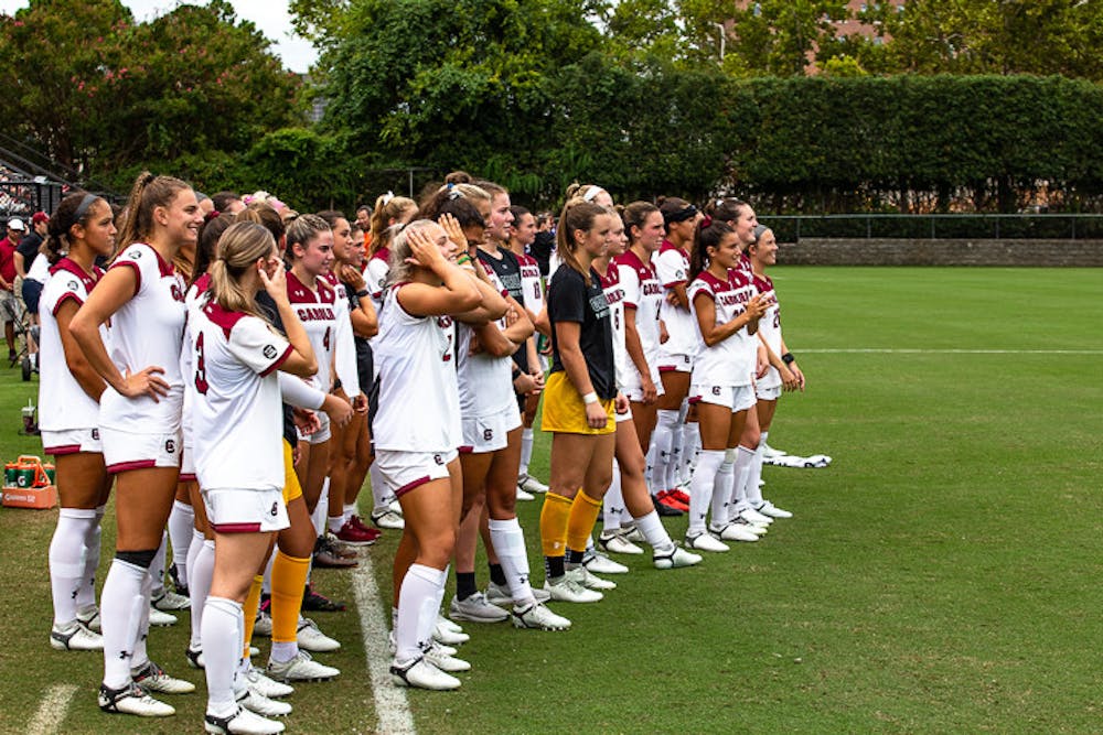 <p>The South Carolina women's soccer team watch as the team's new intro video is unveiled during the Gamecocks matchup with Eastern Carolina matchup on August 21, 2022.</p>