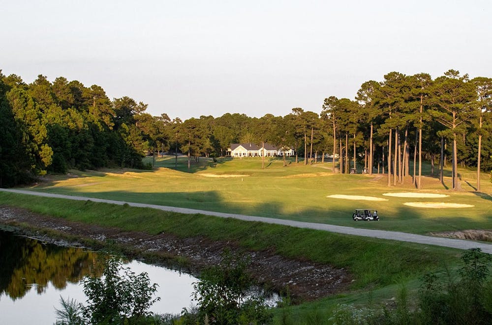 <p>The clubhouse at Oak Hills Country Club Golf Course, across the fairway. Oak Hills' close proximity to campus makes it a great place to play a quick round of golf. &nbsp;</p>