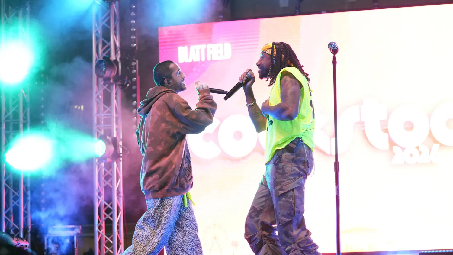 Michael “Mikey” Foster (left) and Charles “Scootie” Anderson (right) of Social House perform on stage during Cockstock on March 24, 2026, at Blatt Field in Columbia, South Carolina. The duo interacted on stage, engaging the crowd during their evening set.