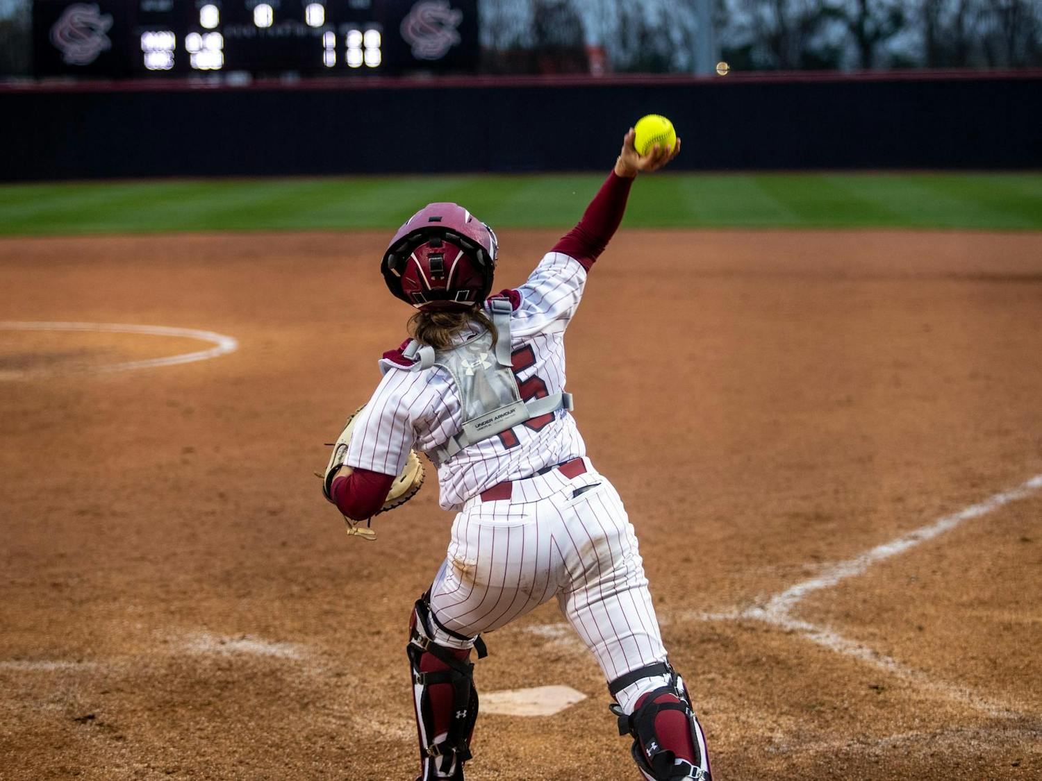 Junior catcher Lexi Winters throws the ball down to second base on Feb. 15, 2025 as the University of South Carolina faces off against Miami Ohio. Winters has 58 putouts so far this season.