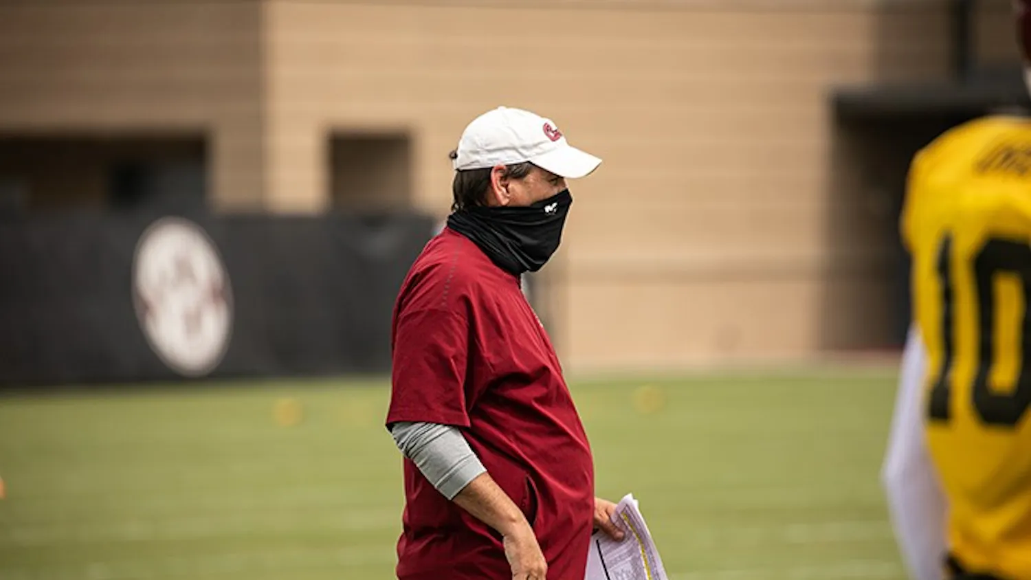 Interim head coach Mike Bobo watches practice from the sidelines during summer training camp. Bobo was named interim head coach Sunday after Will Muschamp was fired.