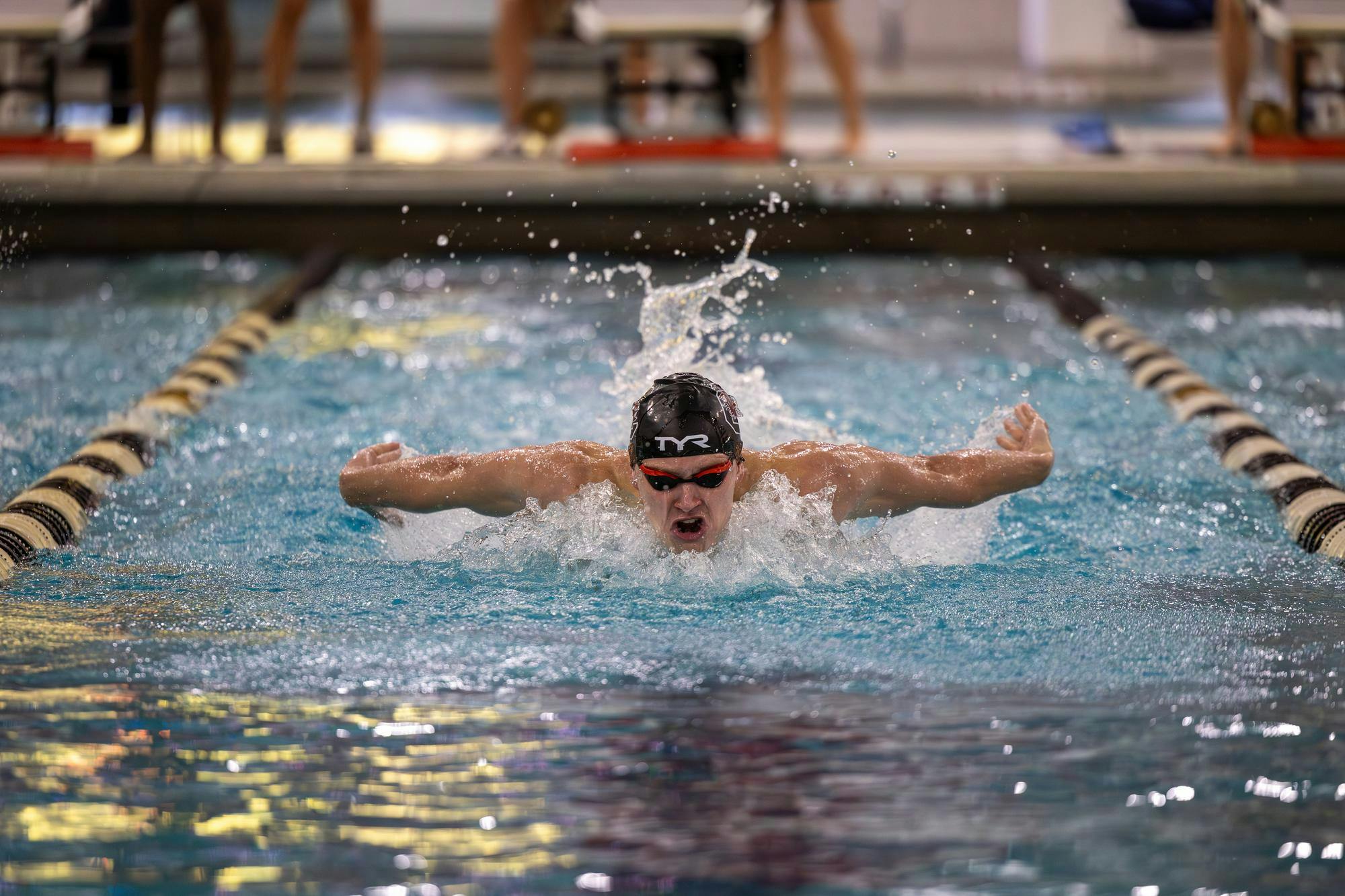 Senior butterfly swimmer Gage Hulbert comes up for a breath of air while swimming the men’s 200-yard butterfly event against North Carolina on Nov. 7, 2025, at the Carolina Natatorium. Hulbert finished in fourth place with a time of one minute, 47.24 seconds.