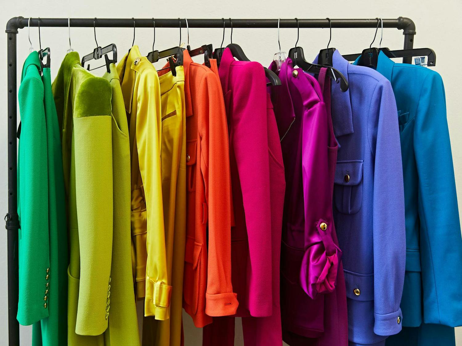 A photo illustration of a rack displaying the work of Sergio Hudson. The Columbia Museum of Art will display Hudson's work beginning Nov. 18, 2023.