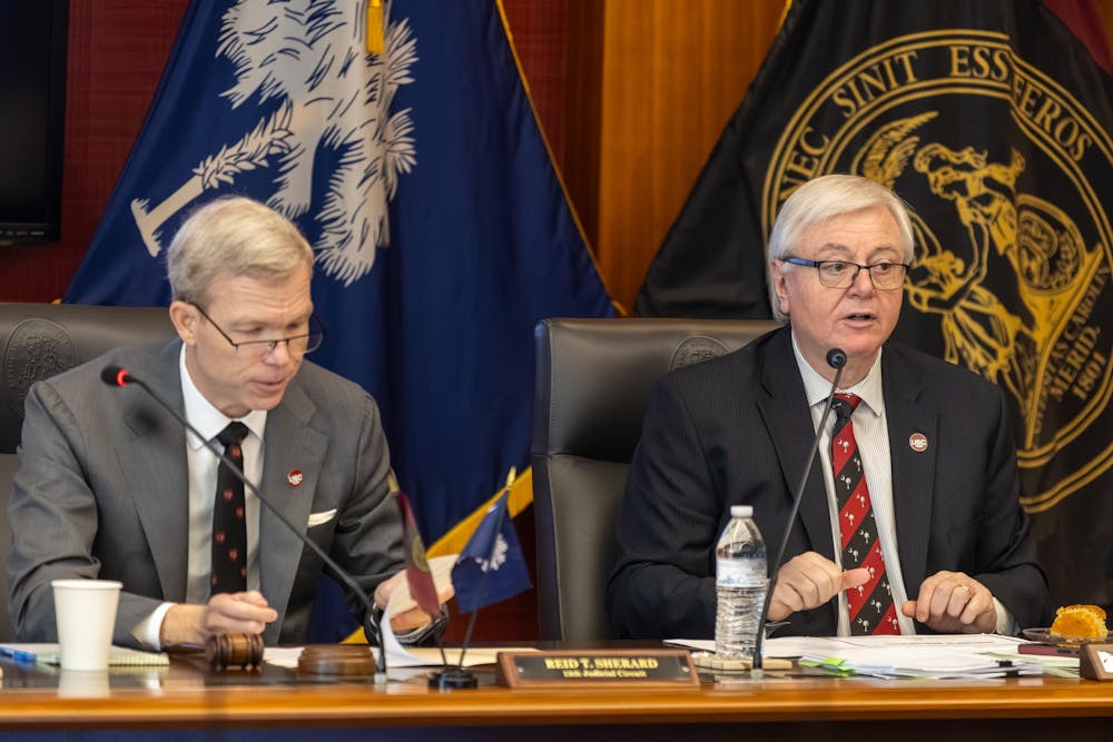 <p>Board member Reid Sherard and USC President Michael Amiridis during the board of trustees meeting on Feb. 20, 2026. The meeting reviewed the proposed budgets for USC's sister campuses and development on a brain health initiative.</p>
