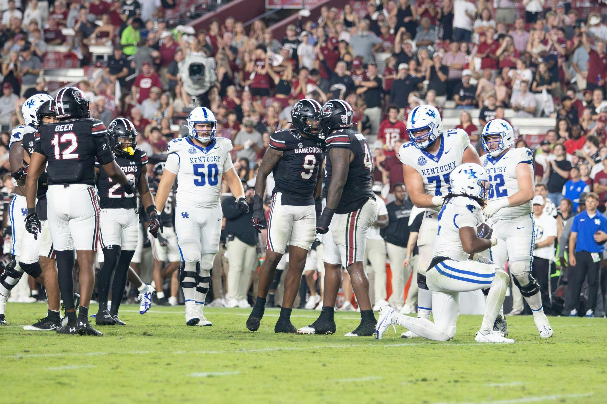 Junior edge rusher Desmond Umeozulu (left) and redshirt senior defensive lineman Monkell Goodwine (right) celebrate after a third down stop against the University of Kentucky at Williams-Brice Stadium on Sept. 27, 2025. The Gamecocks’ defense finished with 62 total tackles against the Wildcats.