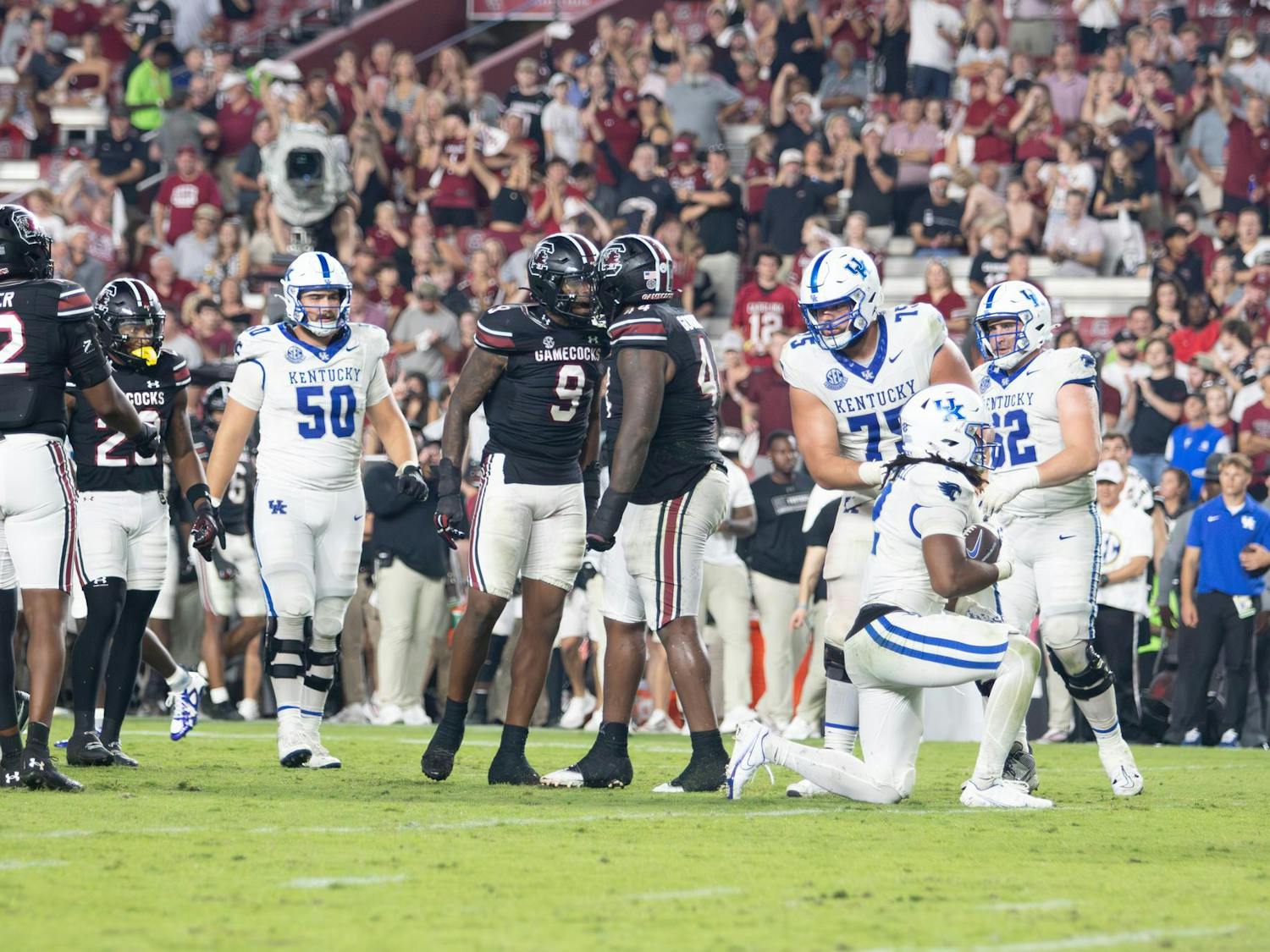 Junior edge rusher Desmond Umeozulu (left) and redshirt senior defensive lineman Monkell Goodwine (right) celebrate after a third down stop against the University of Kentucky at Williams-Brice Stadium on Sept. 27, 2025. The Gamecocks’ defense finished with 62 total tackles against the Wildcats.