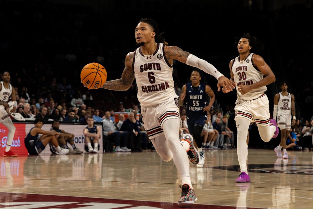 <p>FILE – Senior guard Jamarii Thomas dribbles the ball up the court before dunking against North Florida on Nov. 4, 2024. The Gamecocks currently hold a record of 10-6 (0-3 SEC).</p>