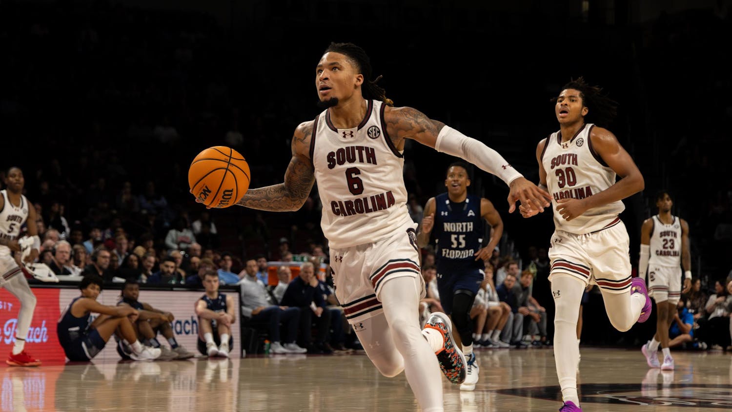 FILE – Senior guard Jamarii Thomas dribbles the ball up the court before dunking against North Florida on Nov. 4, 2024. The Gamecocks currently hold a record of 10-6 (0-3 SEC).