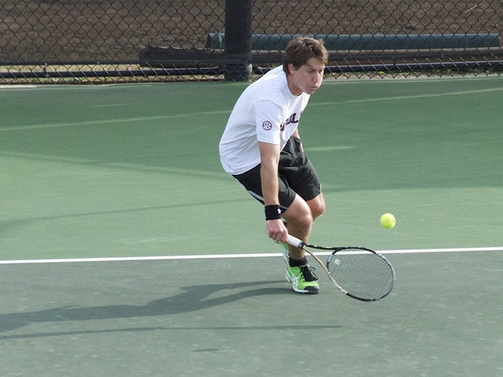Though junior Chip Cox fell in both his singles and doubles matches, coach Josh Goffi said he’s a leader for the team.
