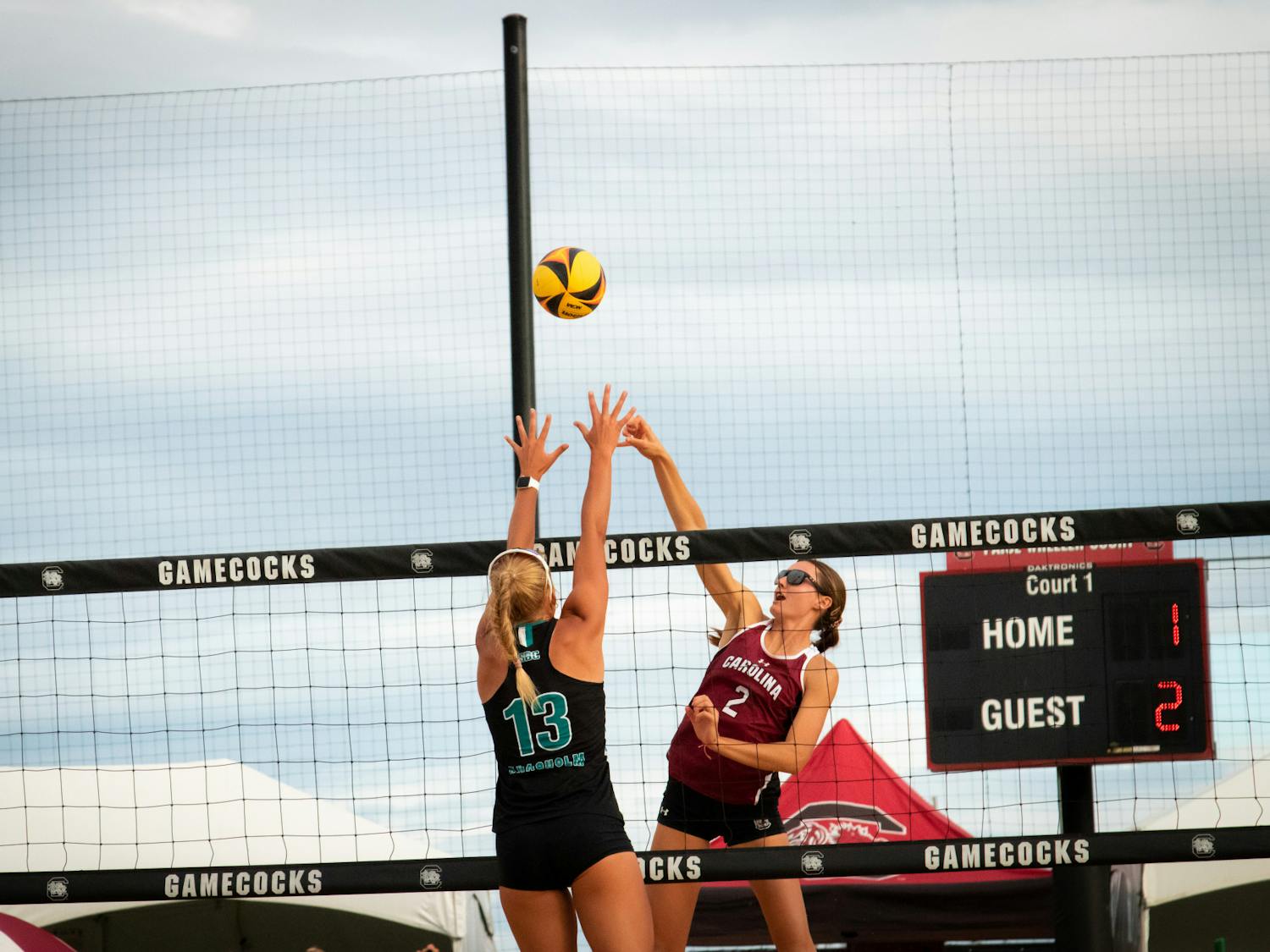 Senior Skylar Allen makes a successful block hit into Coastal Carolina’s net. Allen and graduate student Simone Priebe won their match in two sets, 21-18 and 22-20, on April 14, 2023. &nbsp;&nbsp;
