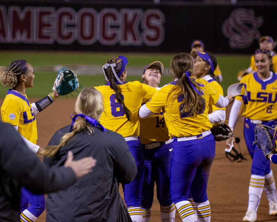 LSU celebrates after junior infielder Karli Petty makes a double play against South Carolina's offense during the second match of the doubleheader at Beckham Field on March 13, 2023. The Tigers beat the Gamecocks 5-1.