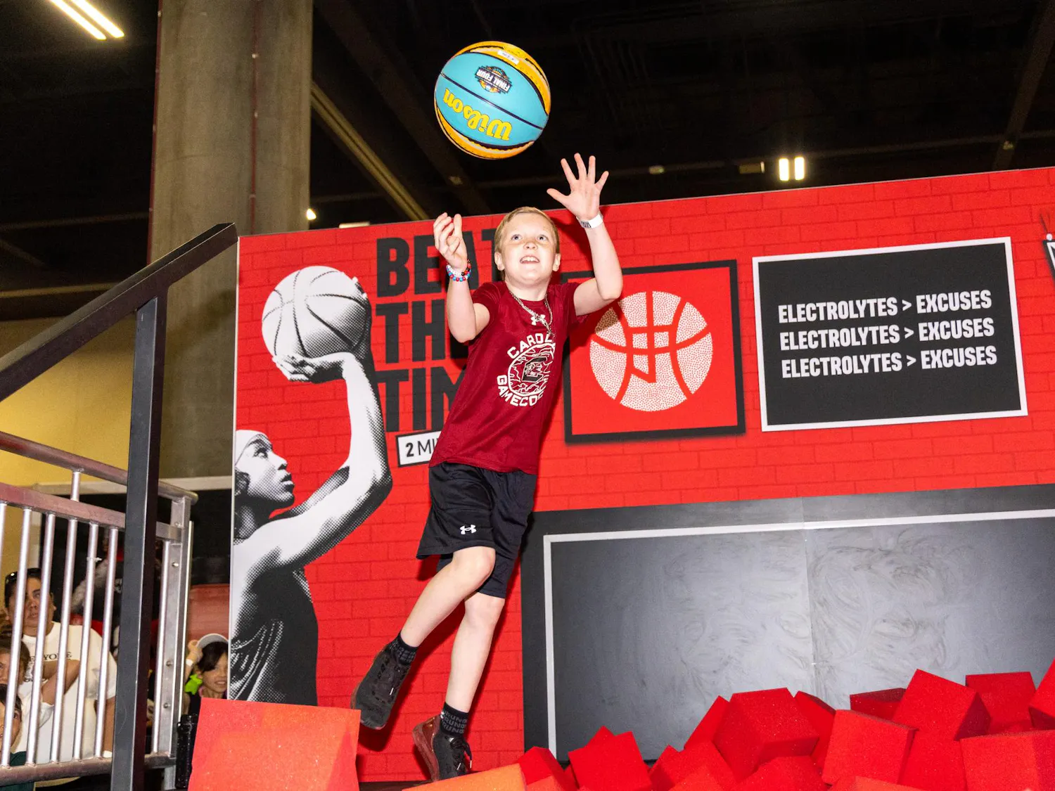 Myrtle Beach resident Landon Ross jumps to catch a ball during a time trial game at Tourney Town during the Final Four in Phoenix, Arizona, on April 3, 2026. Ross said he hopes to cheer the Gamecocks on to a championship win.