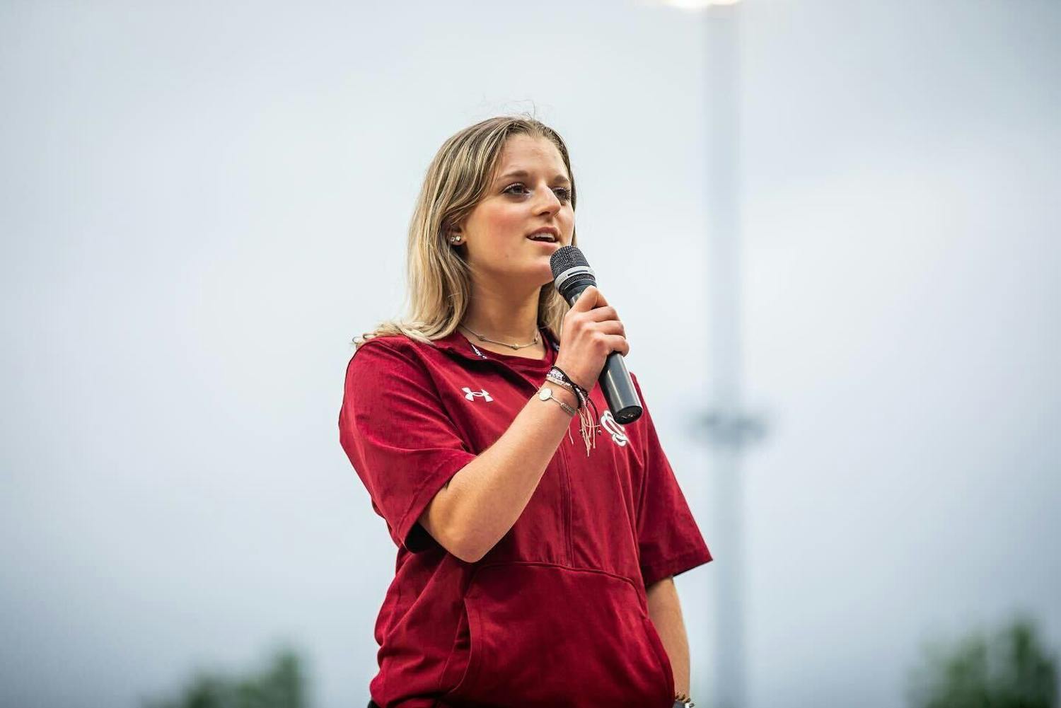 Sydney Herz sings the national anthem before the South Carolina baseball team’s game against Auburn on April 30, 2023. Herz uses her social media accounts to share her love of the game and showcase her life as a college student.