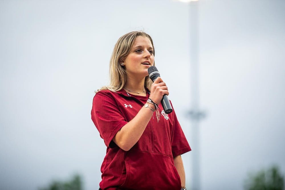 <p>Sydney Herz sings the national anthem before the South Carolina baseball team’s game against Auburn on April 30, 2023. Herz uses her social media accounts to share her love of the game and showcase her life as a college student.</p>
